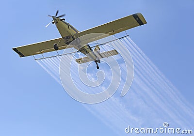 Airplane Spraying Chemicals Stock Photo