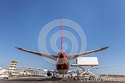 An airplane supplying on the runway Stock Photo