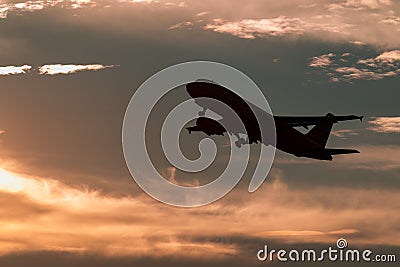 Airplane take off on sunset from airport Editorial Stock Photo