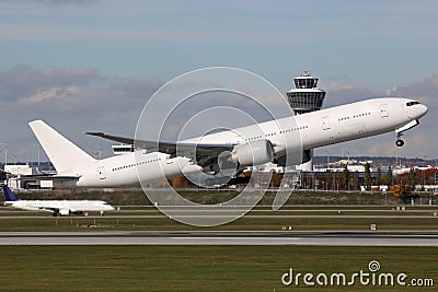 Airplane taking off at airport Stock Photo