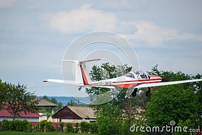 Airplane taking off for the show at Hangariada aeronautical festival in Romania Editorial Stock Photo