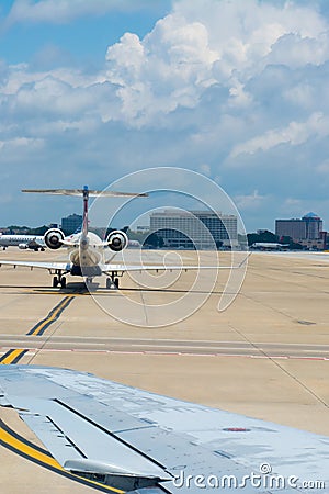 Airplane Taxiing on the Runway at the Airport Editorial Stock Photo
