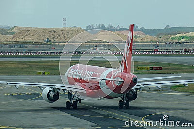 Airplane taxiing on runway of Changi Airport Editorial Stock Photo