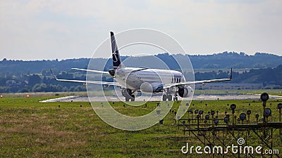 Airplane taxiing to the runway. Editorial Stock Photo