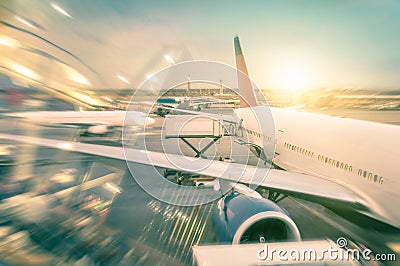 Airplane at the terminal gate in international airport Stock Photo