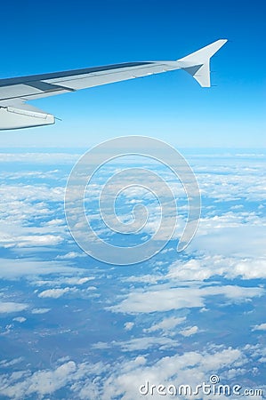 Airplane view - blue sky Stock Photo