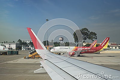 Airplane waiting at Ho Chi Minh City airport, Vietnam Editorial Stock Photo