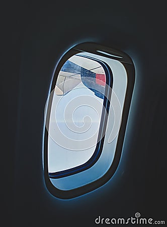 Airplane window picture bright day light Stock Photo