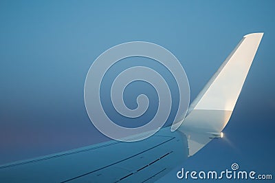 Airplane wing with sky Stock Photo