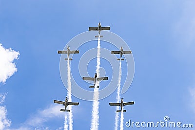 Airplanes on airshow. Aerobatic team performs flight at air show in Krakow, Poland. Stock Photo