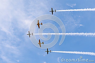 Airplanes on airshow. Aerobatic team performs flight at air show in Krakow, Poland. Stock Photo