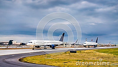 Airplanes lined up for takeoff at Atlanta Airport in the USA Editorial Stock Photo