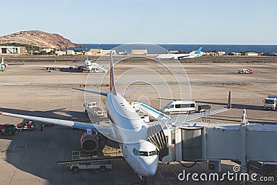Airplanes on the runway, preparing to take off and fly. Airports and travel by plane concept Editorial Stock Photo