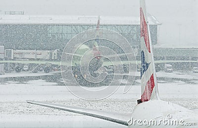 Airplanes at snowstorm Editorial Stock Photo