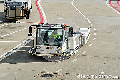 Airport baggage tractor at Amsterdam Airport Schiphol Editorial Stock Photo