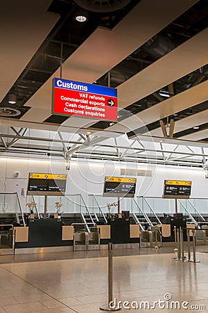 Airport Check in Desks and Customs Sign Stock Photo