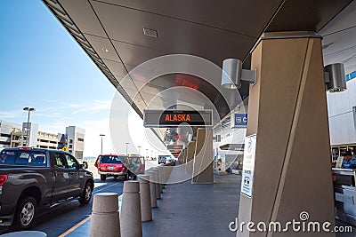 Airport Departure Gates drive through entrance, Alaska Airlines Editorial Stock Photo