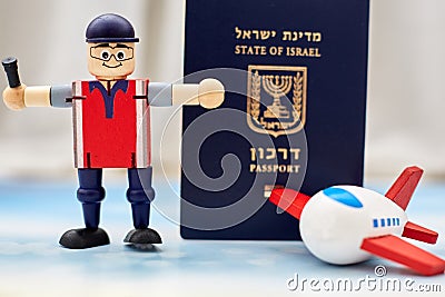 Airport employees toy shows a ban on entering the country from quarantine against an Israeli passport Stock Photo