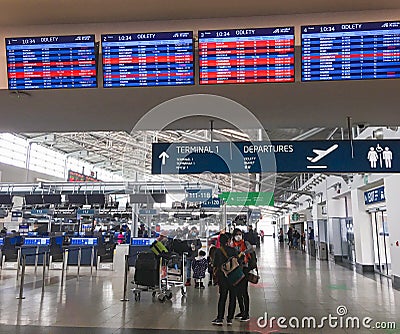 Prague, Czechia - March 17, 2020, airport hall and cancellation of flights departing due to coronavirus, signs on the plates: canc Editorial Stock Photo