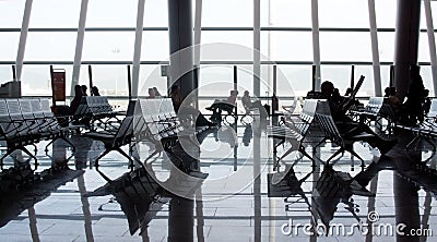 Airport interior large glass window and people Editorial Stock Photo