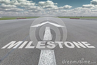 Airport runway arrow milestone Stock Photo