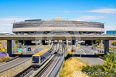 An airport shuttle leaving the Terminal 1 of Paris-Charles de Gaulle Airport in Roissy-en-France Editorial Stock Photo