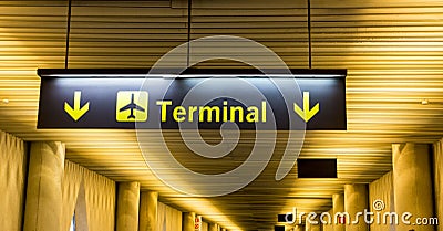 Airport Sign Directing Passengers to the Terminal Building Editorial Stock Photo