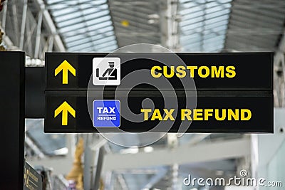 Airport Tax refund and customs sign in terminal at airport Stock Photo