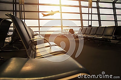 Airport Terminal with empty chair and bursting light, Airplane B Stock Photo
