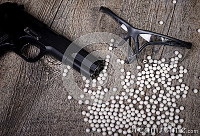 Airsoft gun with glasses Stock Photo