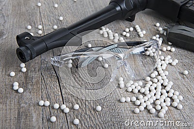 Airsoft gun with glasses Stock Photo