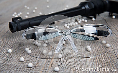 Airsoft gun with glasses Stock Photo