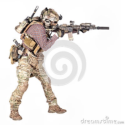 Airsoft player aiming service rifle studio shoot Stock Photo