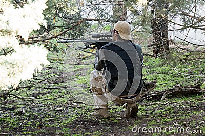 Airsoft sniper shooting Editorial Stock Photo