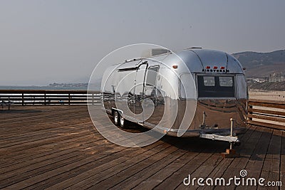 Airstream RV camper parked on the pier in Pismo Beach, California Editorial Stock Photo