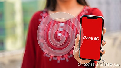 Airtel 5G displayed on a mobile phone device screen Editorial Stock Photo