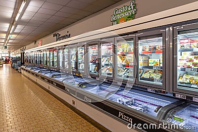 Aisle with refrigerated counters with frozen food in italian discount Editorial Stock Photo
