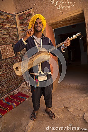 Local man in traditional clothing in Kasbah Ait Ben Haddou in the Atlas Mountains, Morocco. Editorial Stock Photo