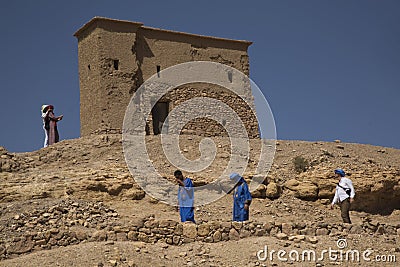 People in Kasbah fortress Ait Ben Haddou in the High Atlas Mountains, Morocco. Editorial Stock Photo