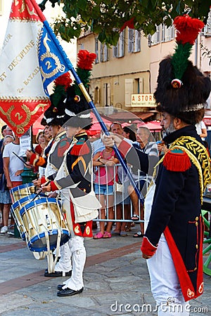 The reenactors dressed as Napoleonic soldiers for celebration the Napoleon birthday who was born in Ajaccio. Corsica Editorial Stock Photo