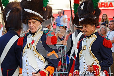 The reenactors dressed as Napoleonic soldiers for celebration the Napoleon birthday who was born in Ajaccio. Corsica Editorial Stock Photo