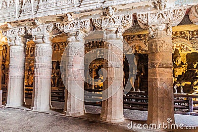 AJANTA, INDIA - FEBRUARY 6, 2017: Columns in the chaitya (prayer hall), cave 26, carved into a cliff in Ajanta, Maharasthra state Stock Photo