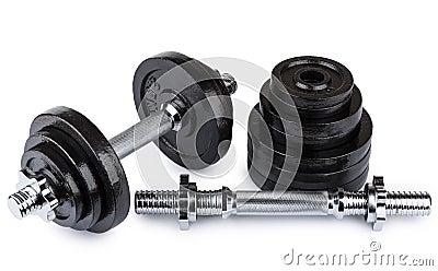 Ajustable dumbbells and stack of metallic disks Stock Photo