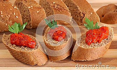 Ajvar on bread slices Stock Photo