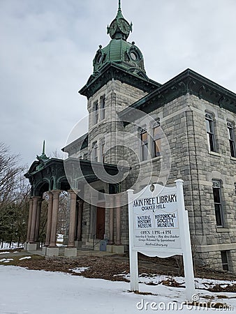 Akin Free Library sign and building with oxidized copper cupola Editorial Stock Photo