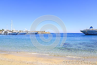 Akti sachtouri beach with Nailac tower on sea in Rhodes old town Stock Photo