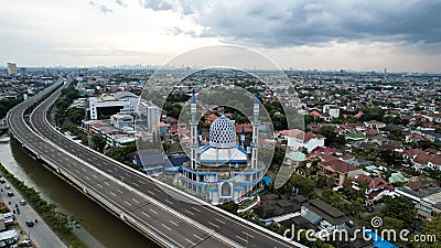 Al-azhar Center Mosque panorama view Largest Mosque in Bekasi. Ramadan and Eid Concept and noise cloud when sunset or sunrise view Editorial Stock Photo