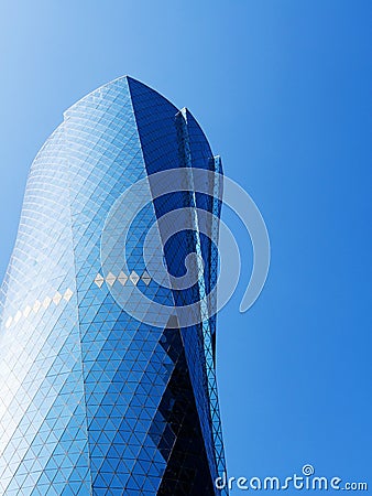 Al Bidda Tower against clear blue sky, close up, copy space. Financial success concept Editorial Stock Photo