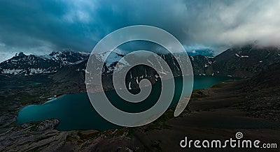 Ala-Kul Lake from the Alakel mountain pass in the Tien Shan Mountains, Karakol, Kyrgyzstan. Panoramic horizontal photo. Stock Photo