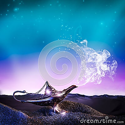 Aladdin lamp in desert Stock Photo